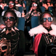 Like these bespoke looking children, I took my father, a person who does not typically watch superhero movies, to see Black Panther dressed in the biggest African print skirt I owned.